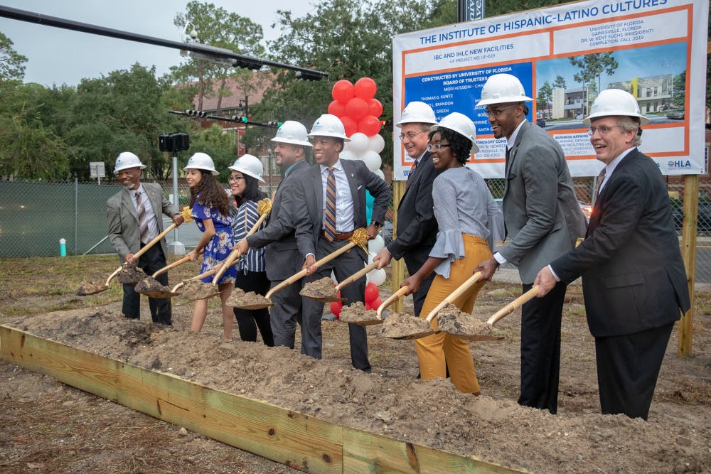 Leaders from the Institute of Black Culture and Institute of Hispanic-Latino Cultures, along with UF President Kent Fuchs and Student Body President Ian Green, break ground on the site of the new buildings for the IBC and La Casita located at 1510 W University Ave. on Wednesday evening.  