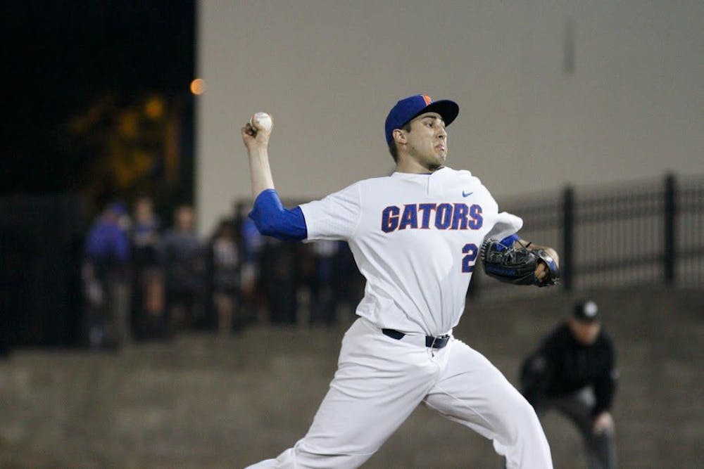 <p>UF pitcher Alex Faedo throws a pitch during Florida's 5-4 win against William &amp; Mary on Feb. 17, 2017, at McKethan Stadium.&nbsp;</p>