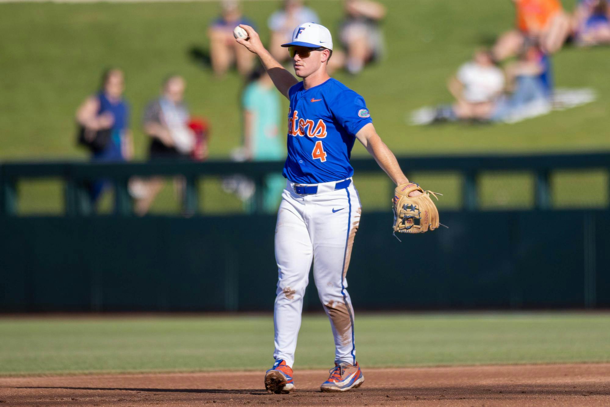 Florida infielder Cade Kurland (4) throws the ball infield during an NCAA college baseball game against Auburn at Condron Family Ballpark in Gainesville, Fla., Friday, April 17, 2026.