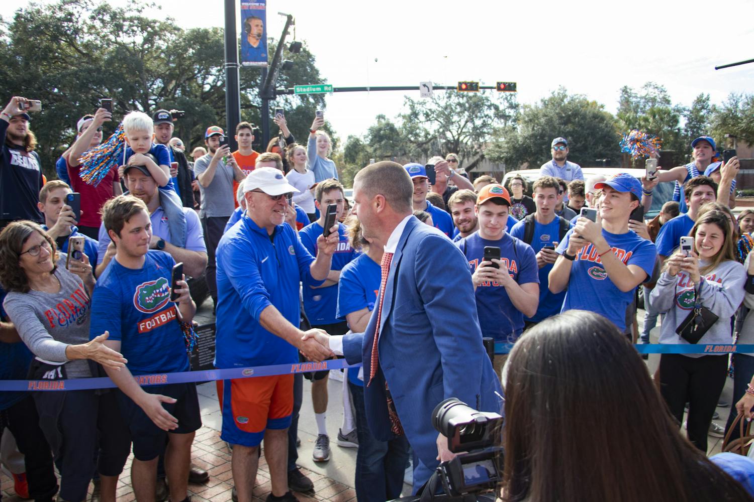 Florida Football Coach Billy Napier arrives with his family at Ben Hill Griffin Stadium for his first day on the job on Sunday, Dec. 5, 2021.