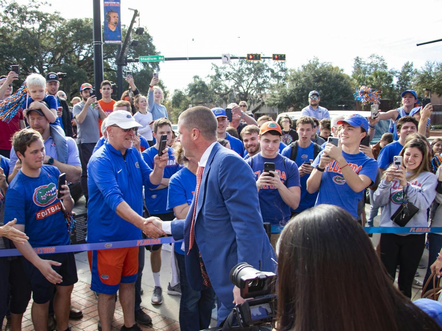 Florida Football Coach Billy Napier arrives with his family at Ben Hill Griffin Stadium for his first day on the job on Sunday, Dec. 5, 2021.