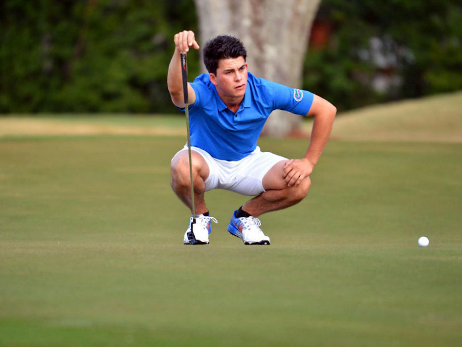 Gordon Neale lines up a shot during the SunTrust Gator Invitational on Feb. 21 at the Mark Bostick Golf course.