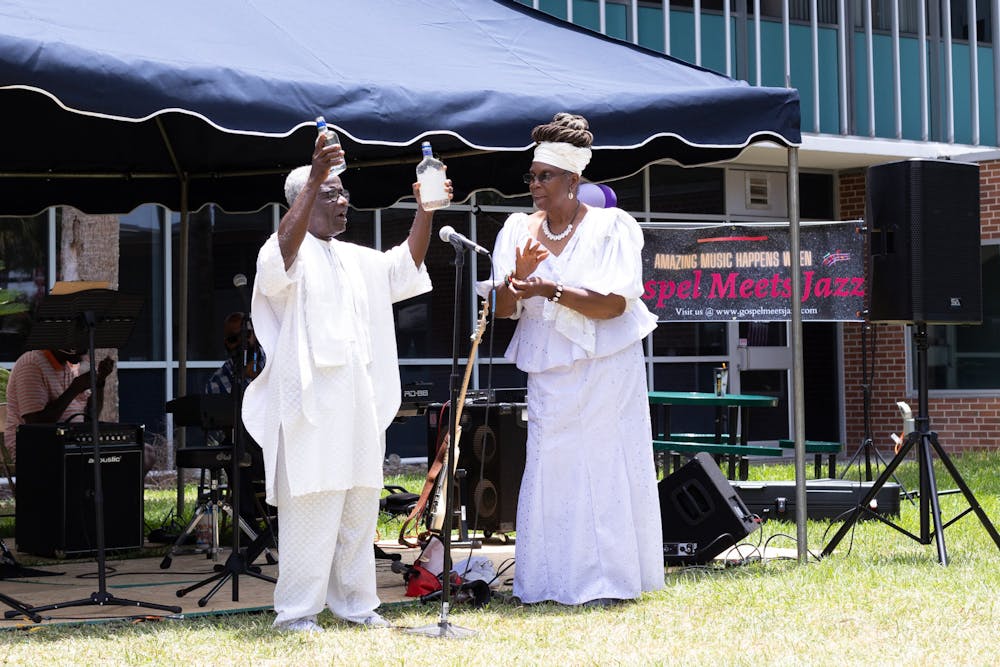 People attend the opening of the Alachua County Remembrance Project Juneteenth exhibit on Saturday, June 1, 2024.