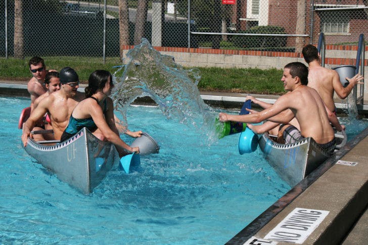 UF students cool down as they try to sink opposing teams during Battleship, an event hosted by the Department of Recreational Sports on Saturday.