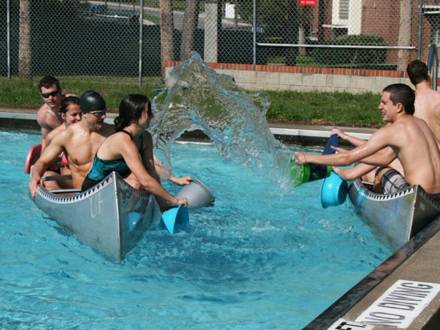 UF students cool down as they try to sink opposing teams during Battleship, an event hosted by the Department of Recreational Sports on Saturday.