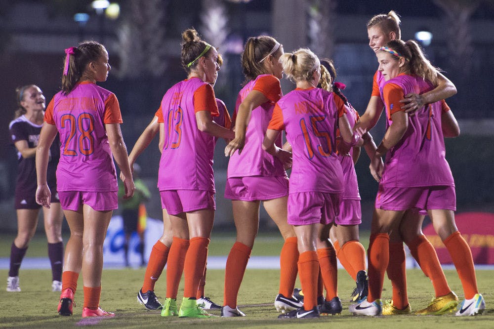 UF soccer players celebrate a goal during Florida's 5-1 win against Mississippi State on Friday at James G. Pressly Stadium.