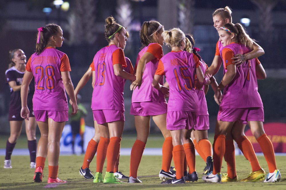 <p>UF soccer players celebrate a goal during Florida's 5-1 win against Mississippi State on Friday at James G. Pressly Stadium.</p>