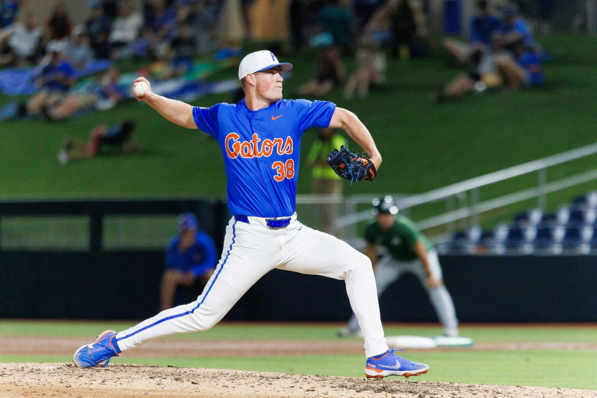 Florida right-handed pitcher Cooper Walls (38) throws a pitch during an NCAA baseball game against Jacksonville University, Tuesday, March 31, 2026, in Gainesville, Fla.