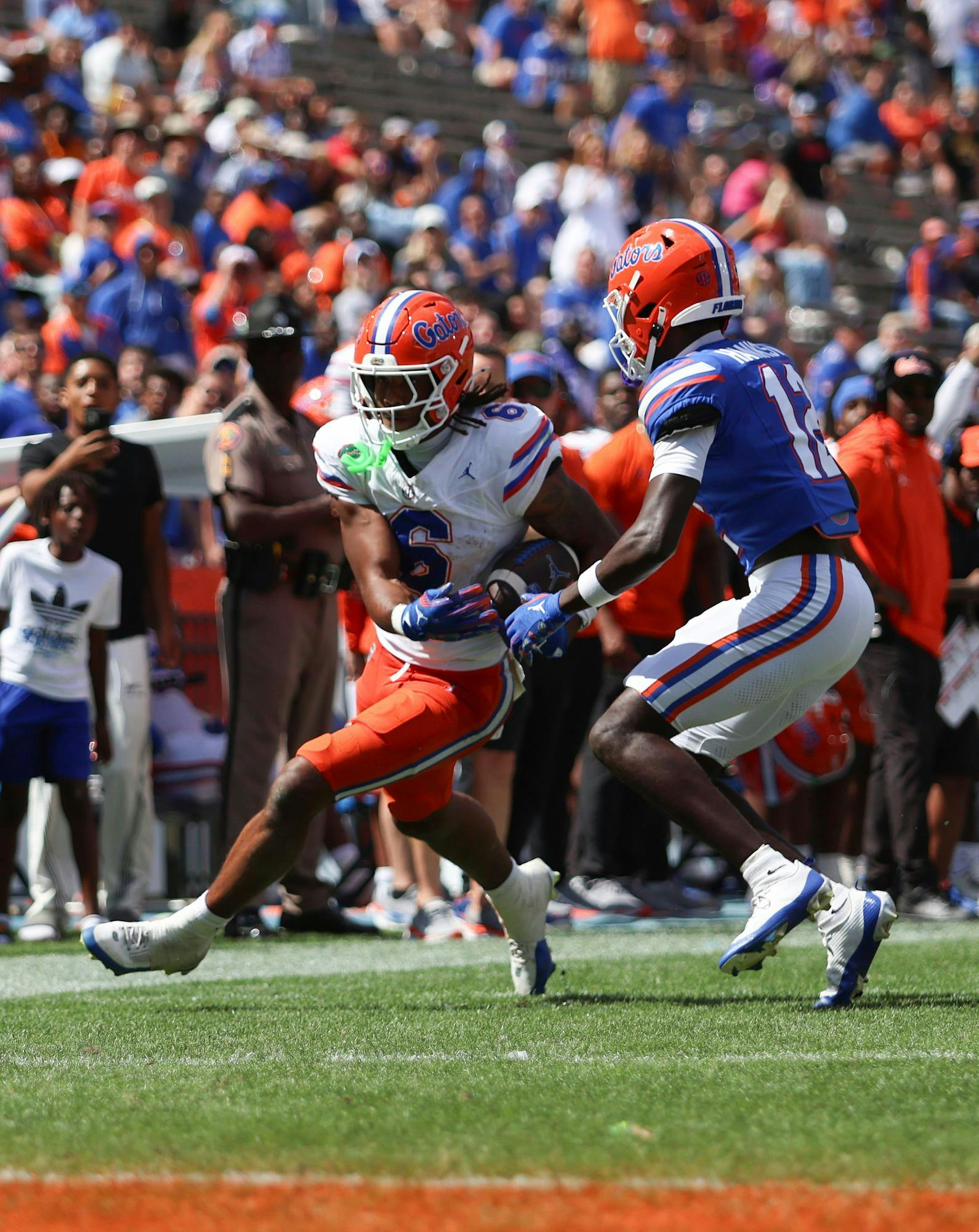 Dallas Wilson dodges a tackler during the Gators' Orange and Blue game on Saturday, April 12, 2025 at Ben Hill Griffin Stadium in Gainesville, Fla. / UAA Communications