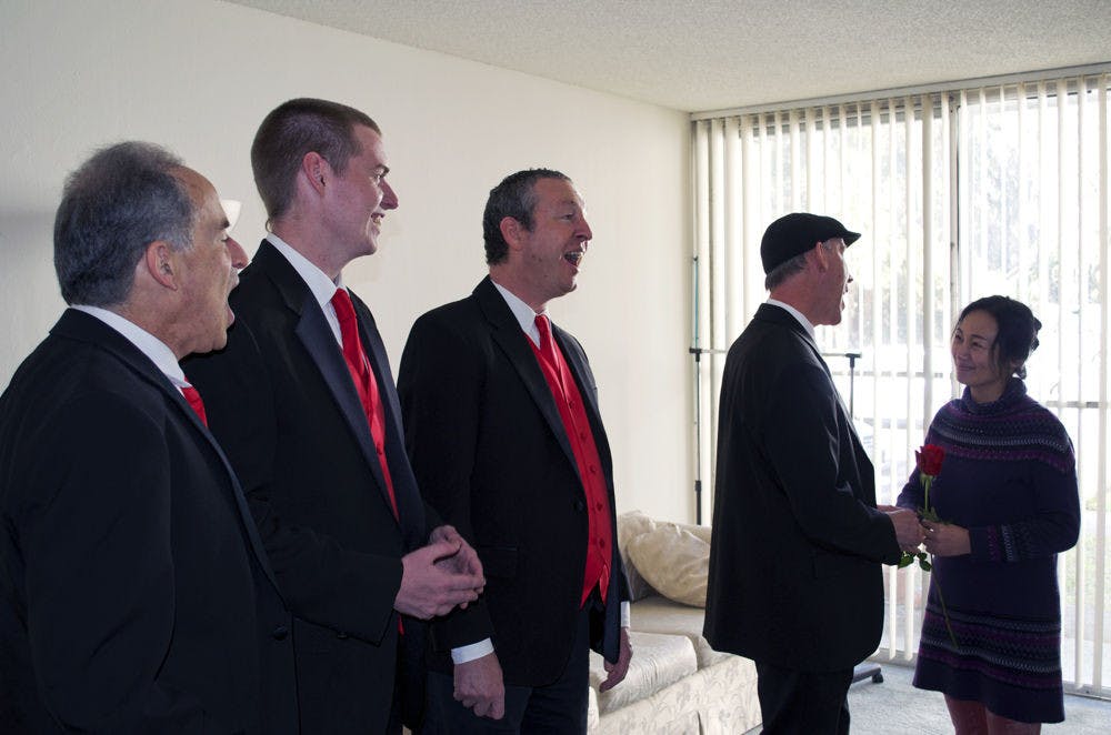 <p>From left: Michael Roth, 63, CJ Shaw, 28, Tyson Adams, 47, and Bob Tucker, 59, all members of the Barbergators, sing “Heart of My Heart,” to Lingyan Li, 44, a visiting scholar from China, who is engaged to Tucker. “She leaves the U.S. March 2nd, so we appreciate how special this time together is,” Tucker said.</p>