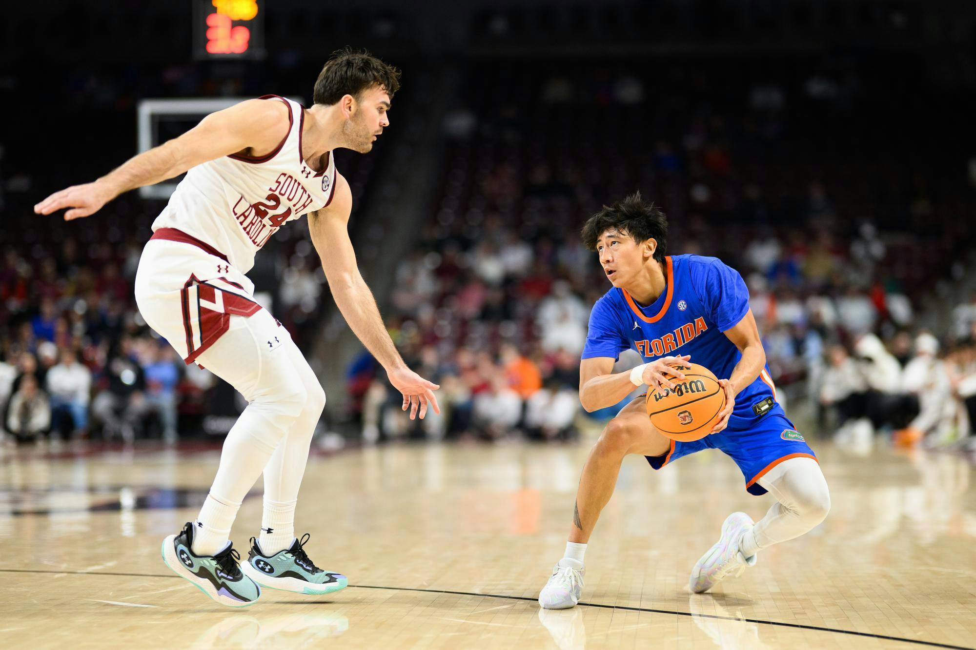 Florida guard Xaivian Lee (1) pulls back for a three during the second half of an NCAA college basketball game against South Carolina, Wednesday, Jan. 28, 2026, in Columbia, S.C.