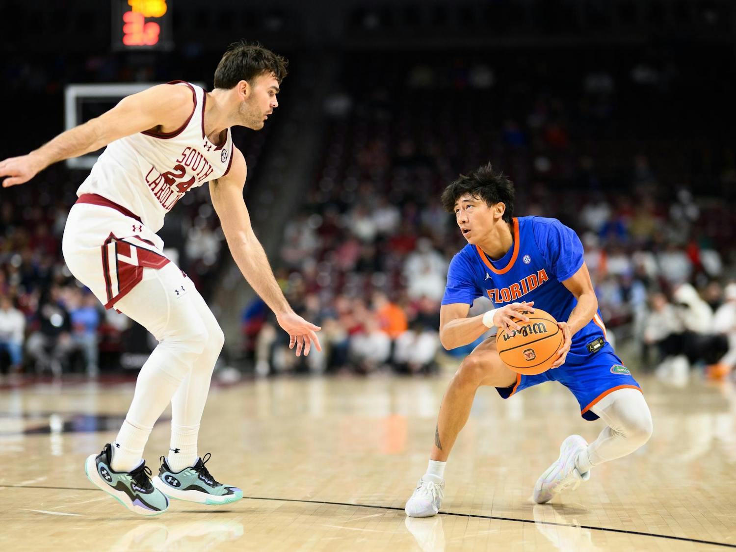 Florida guard Xaivian Lee (1) pulls back for a three during the second half of an NCAA college basketball game against South Carolina, Wednesday, Jan. 28, 2026, in Columbia, S.C.