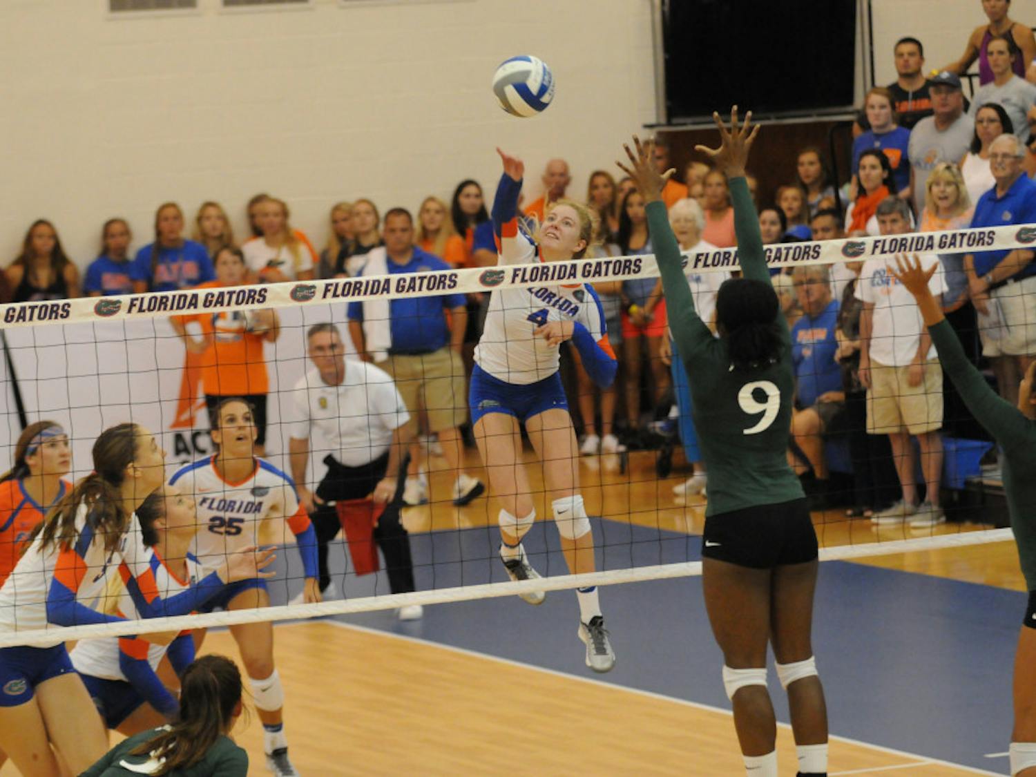 UF outside hitter Carli Snyder slams down a kill attempt during Florida's 3-0 win against Jacksonville on Sept. 16, 2016, inside the Lemerand Athletic Center.