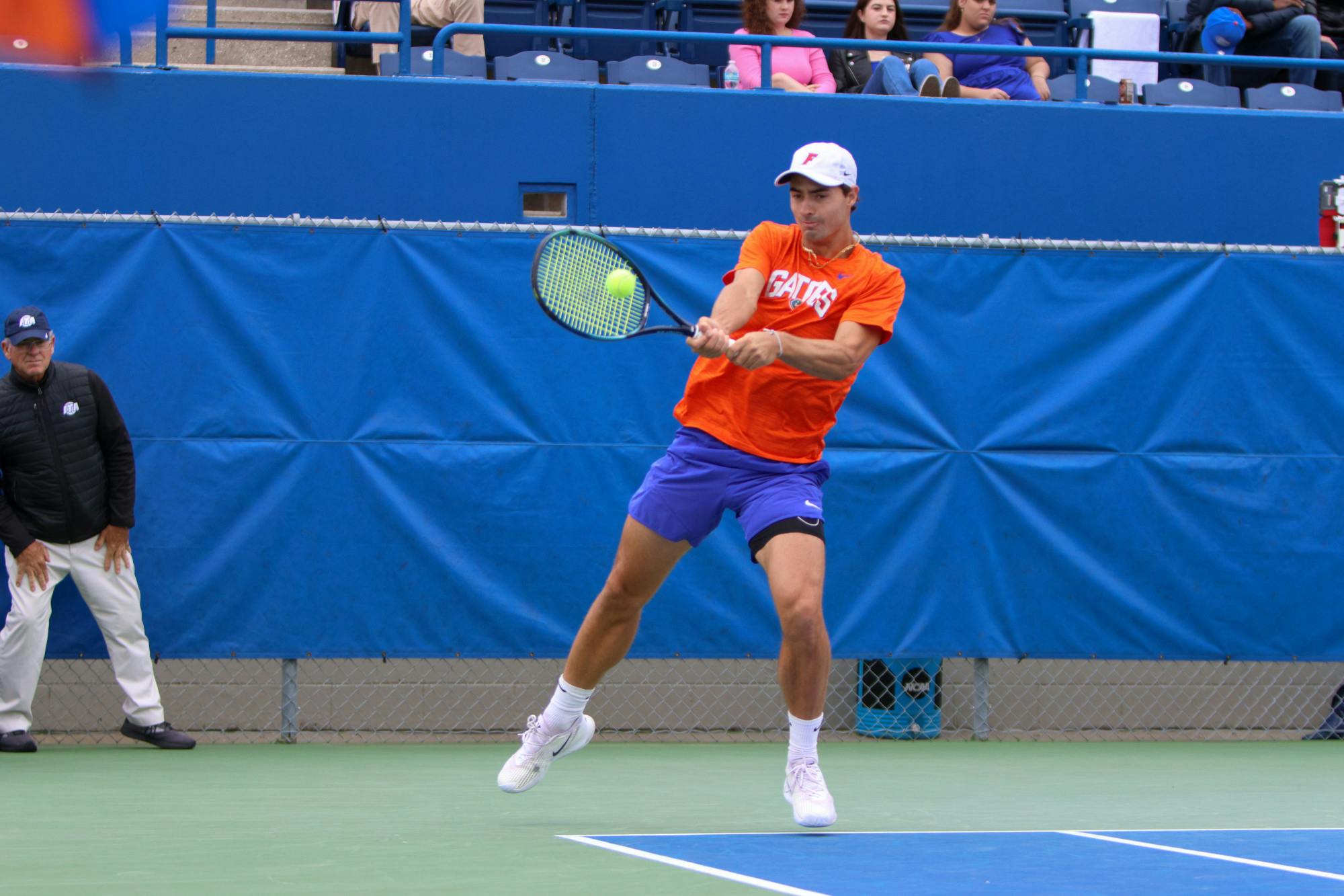 Florida graduate student Axel Nefve swings his racket during the Gators' 4-3 loss to the No. 7 Georgia Bulldogs Sunday, April 9, 2023.
