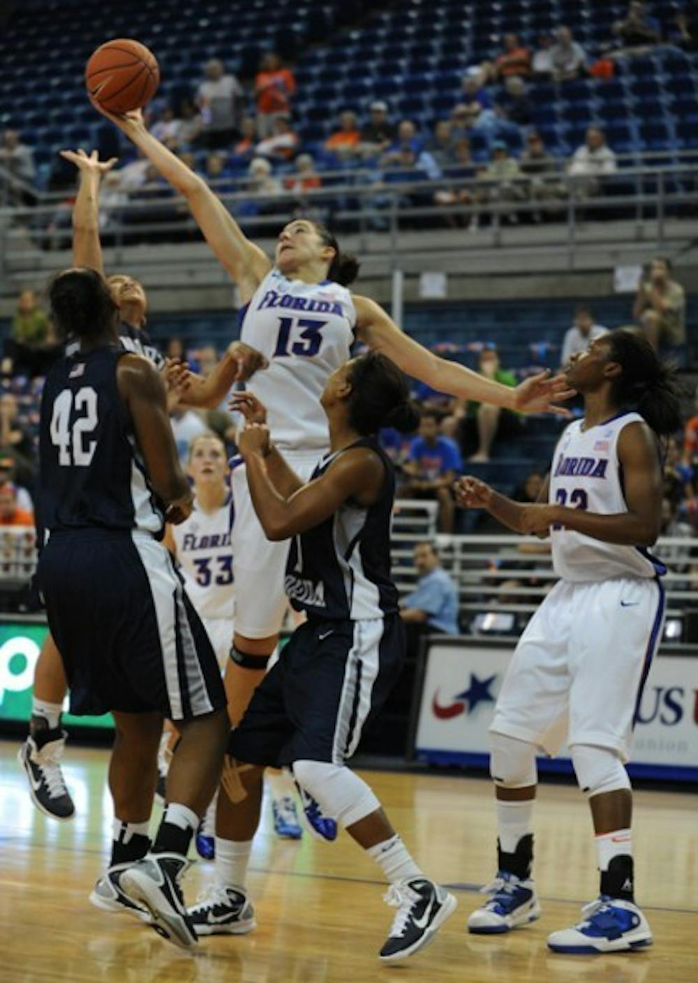 <p>Center Azania Stewart (13) said UF’s post players can build on last year’s strong rebounding effort.</p>