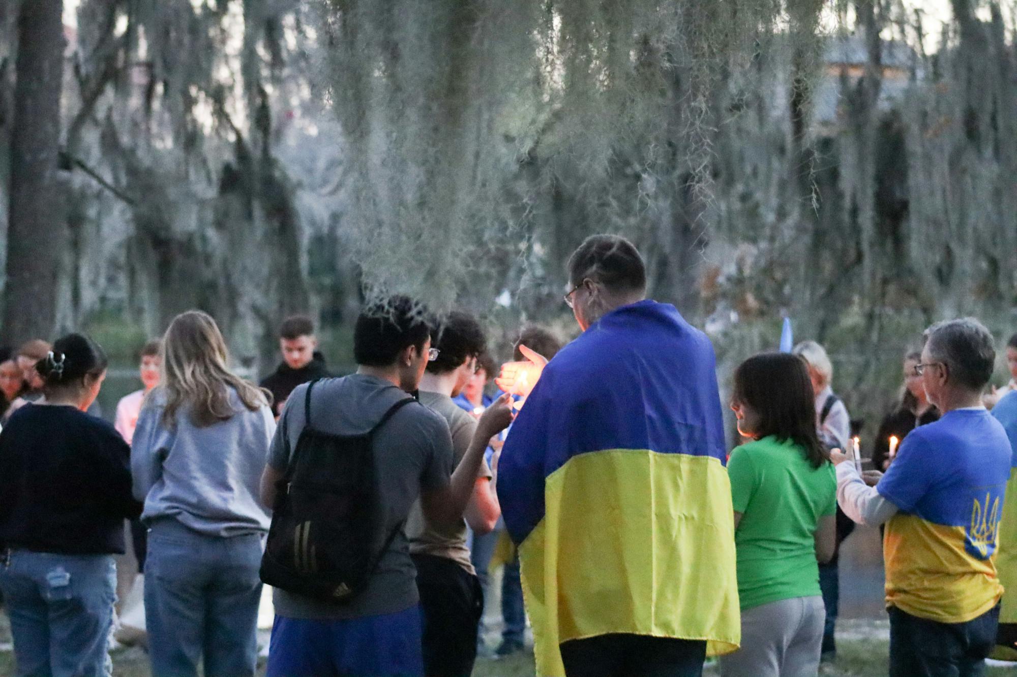Attendees gather at a vigil for Ukraine on Saturday, Feb. 24, 2024.
