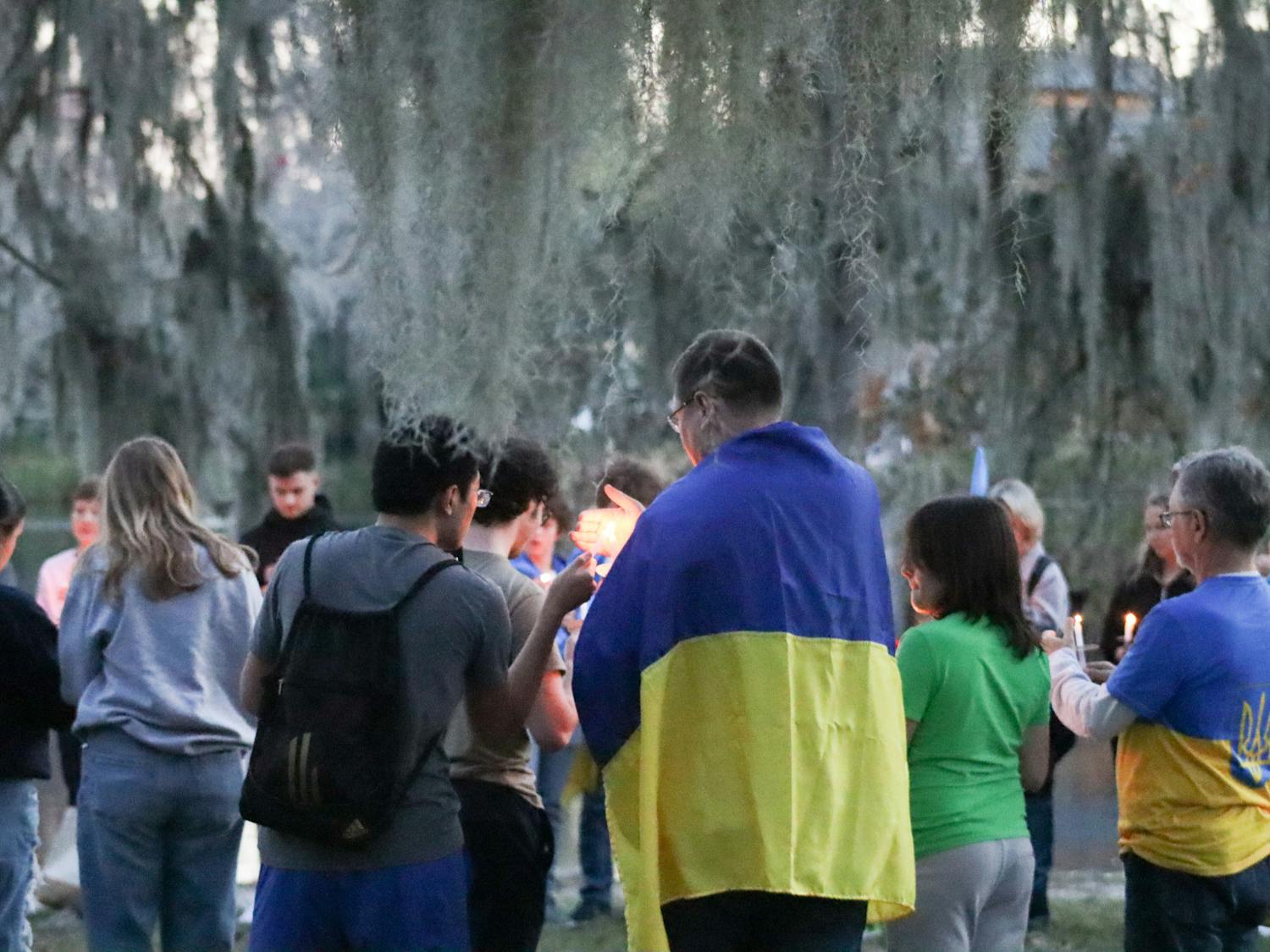 Attendees gather at a vigil for Ukraine on Saturday, Feb. 24, 2024.