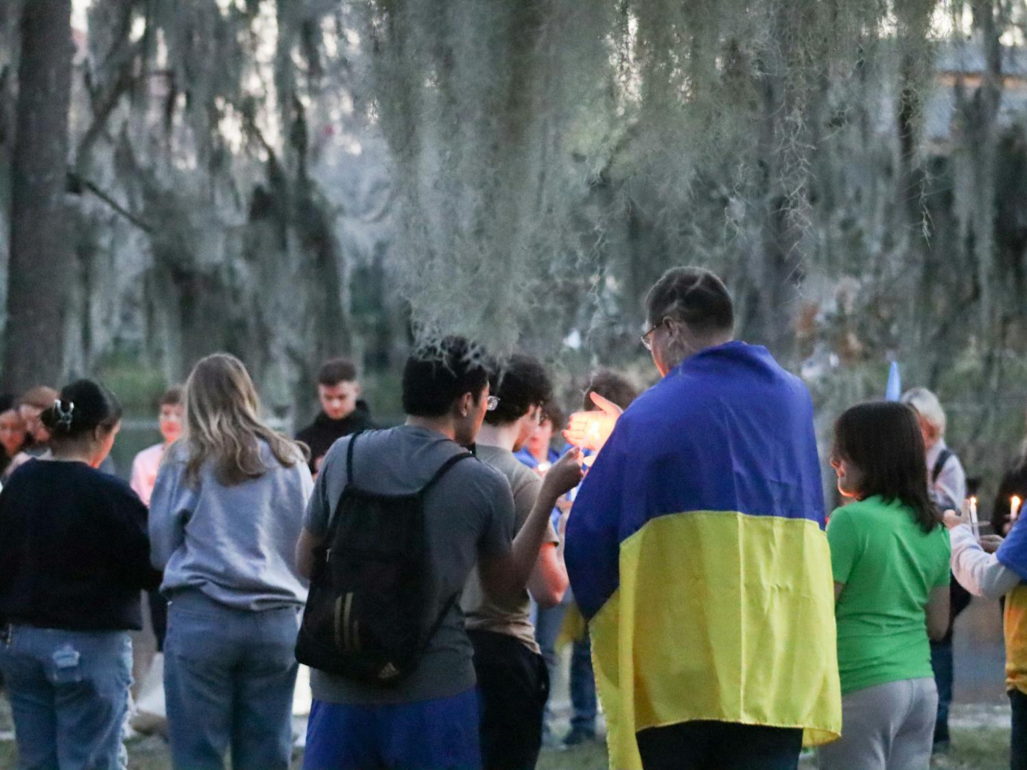 Attendees gather at a vigil for Ukraine on Saturday, Feb. 24, 2024.