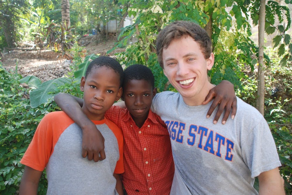  Over Winter Break, UP students completed volunteer work in Haiti. The group renovated a house, distributed food, and spent time with children. Photos courtesy of Katy Jo Novinger.