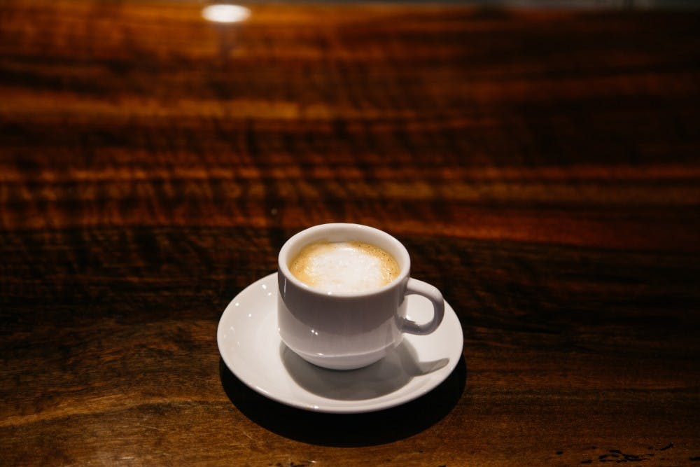 Set of different cute cups with coffee - americano, cappuccino