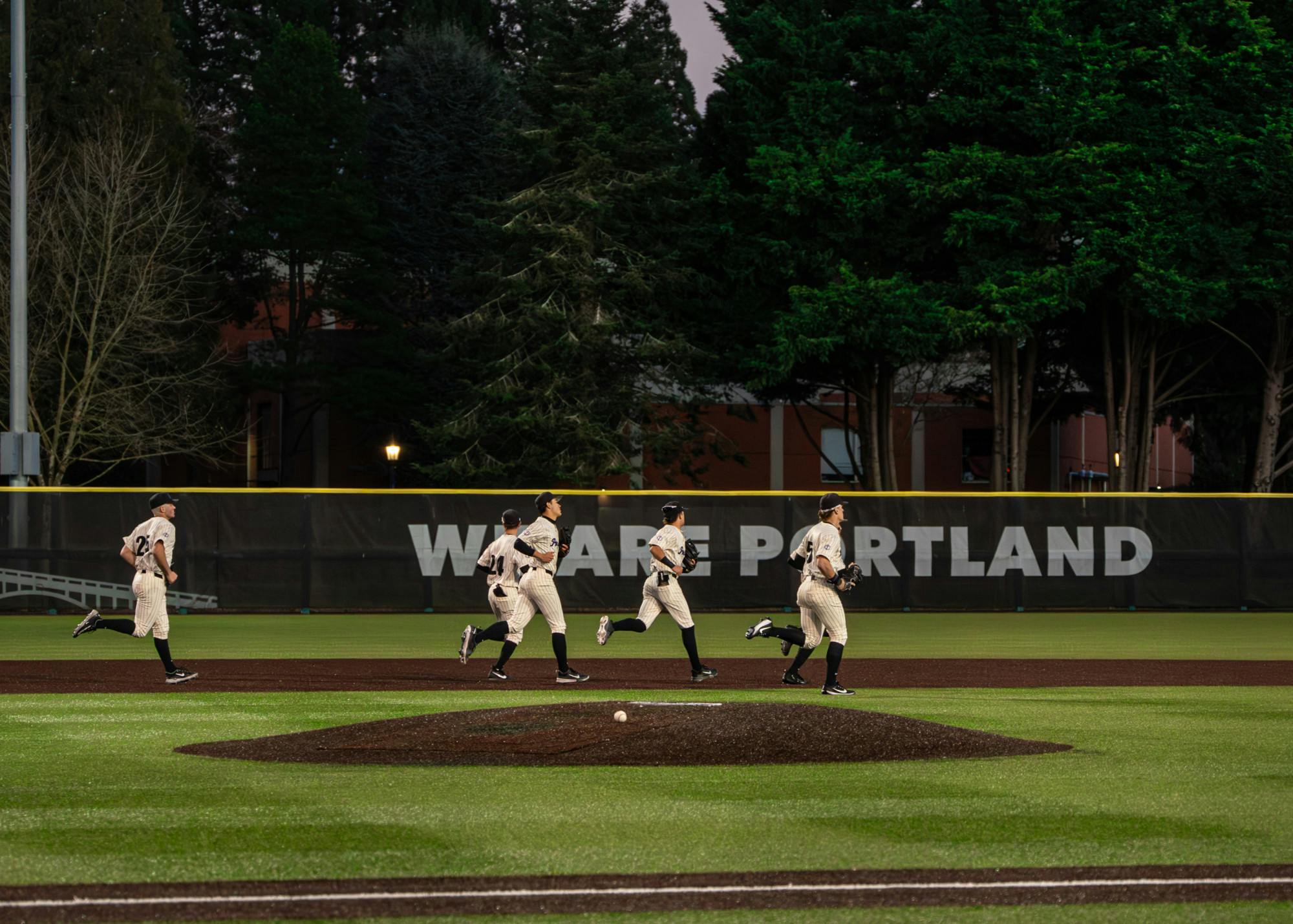 The defense takes the field against the Niagara Purple Eagles on Feb. 27. Portland won 8-5.
