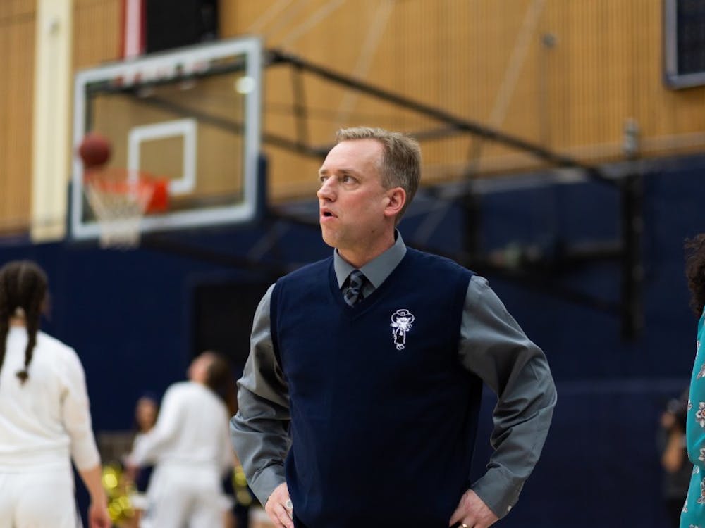 George Fox head coach Michael Meek was announced as the new head coach for UP's women's basketball program on Wednesday.