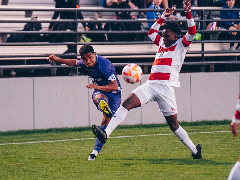 Kevin Bonilla crosses the ball in a game against CSUN.