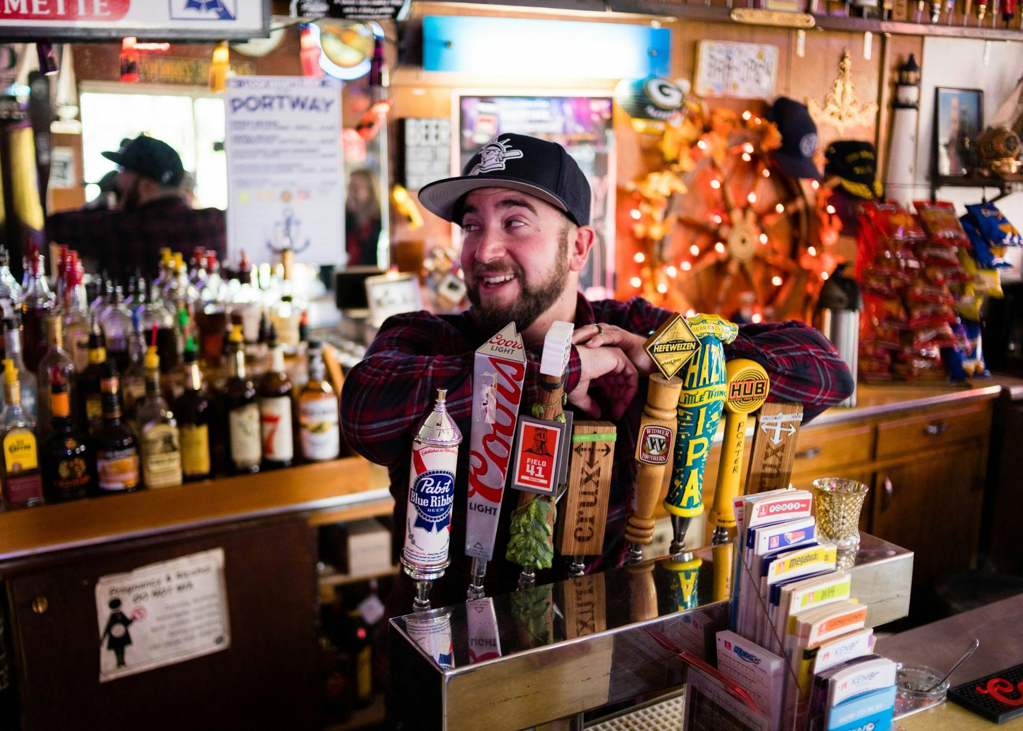 Tim Ward serves UP students over the age of 21 as their favorite neighborhood bartender and confidante at Portway Tavern.