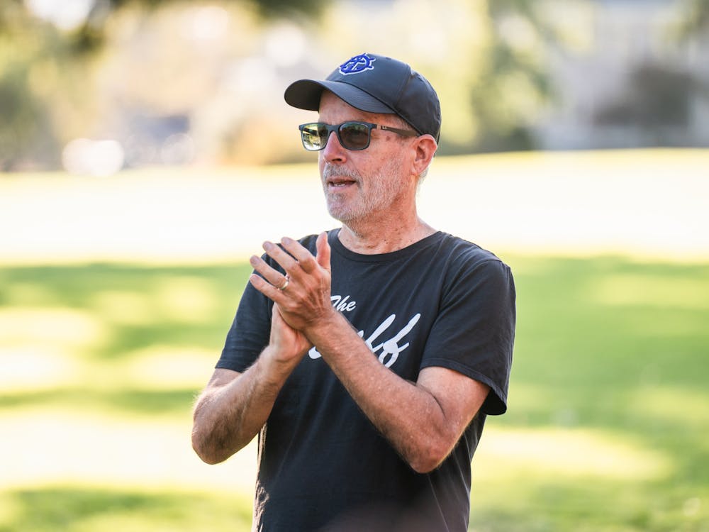Men's Cross Country Coach Rob Connor during a practice.