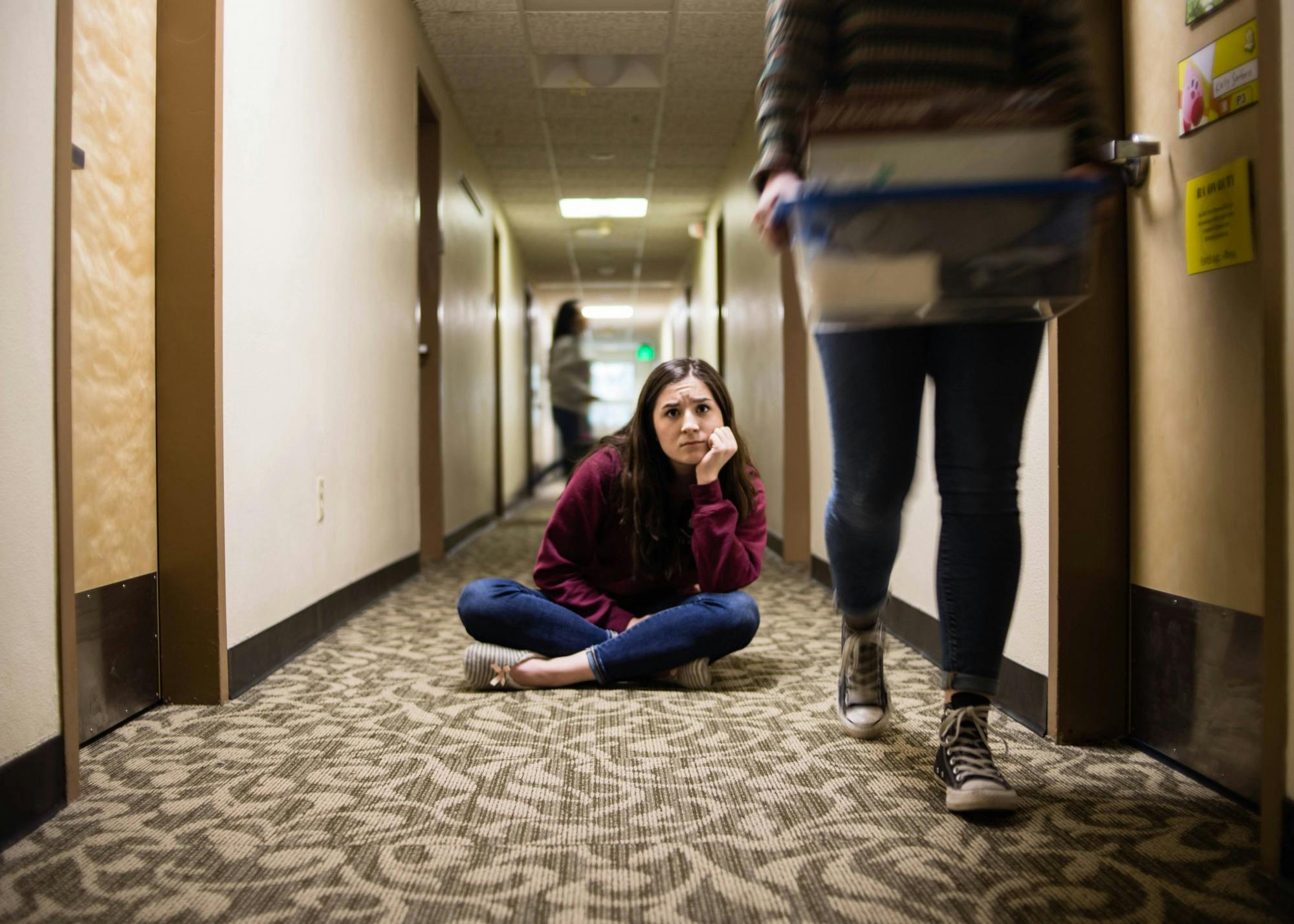 The types of requests submitted by students living on campus to remain on campus included those for students who had to travel internationally or across the country, those whose family members have underlying health conditions, students without access to the internet at home and more. Photo illustration by Annika Gordon.