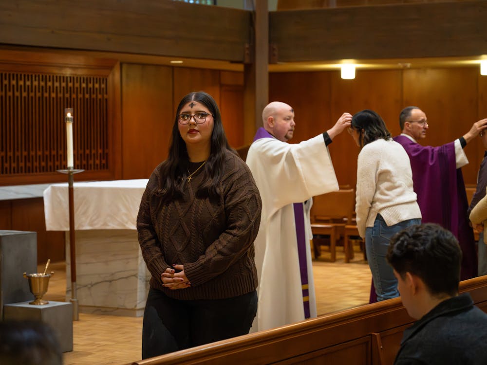 Community members receive ashes during Ash Wednesday Mass in the Chapel of Christ the Teacher on Feb. 18, 2026.