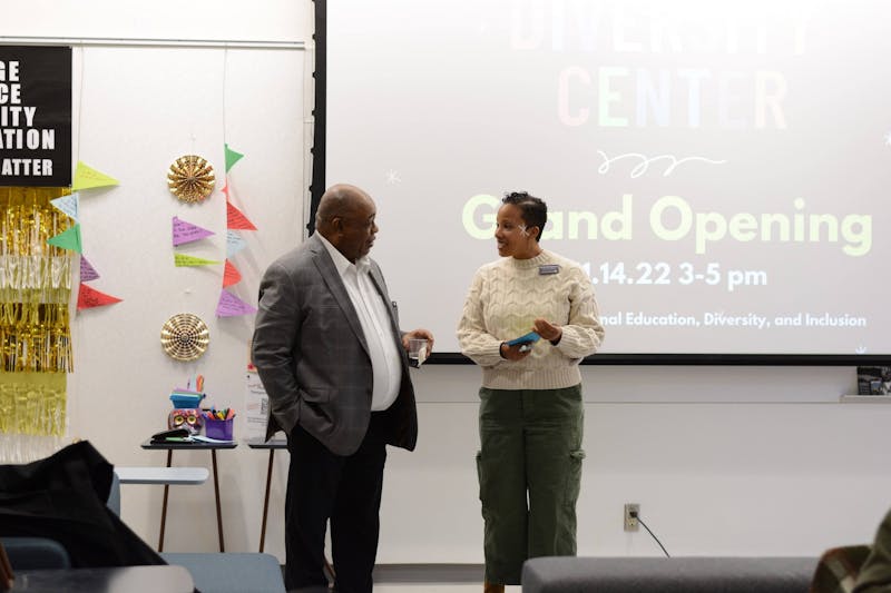Vice President for Marketing & Communications Michael Lewellen and Director of Study Abroad Maraina Montgomery at the Diversity Center grand opening.