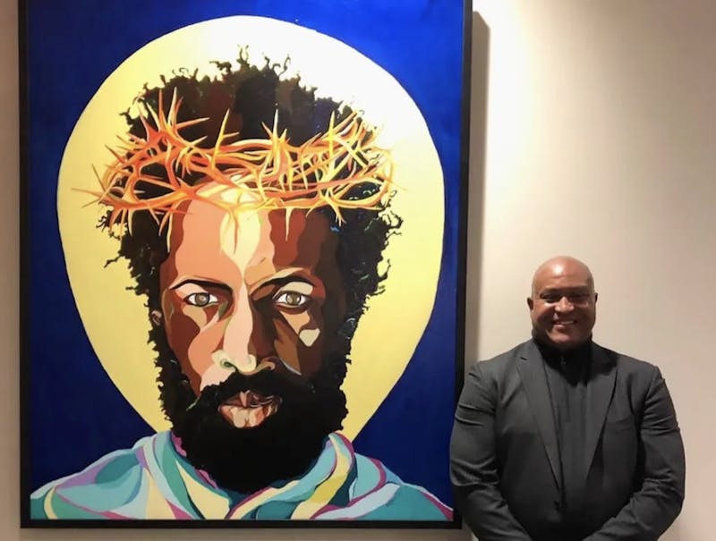 Gerald Roulette, artist behind &quot;The Great I Am,&quot; poses next to his work. Photo courtesy of Gerald Roulette.Photo courtesy of Gerald Roulette