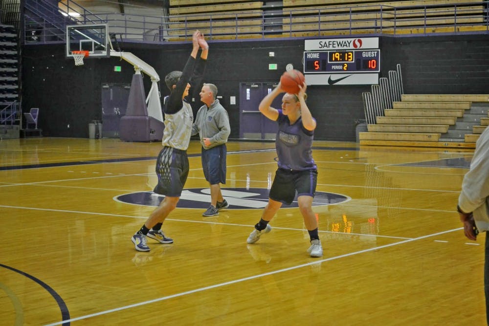  Freshman guard Kaylie Van Loo looks to get around one of the volunteers the women's basketball team had at practice last weekend.Photo by David DiLoreto/TheBeacon