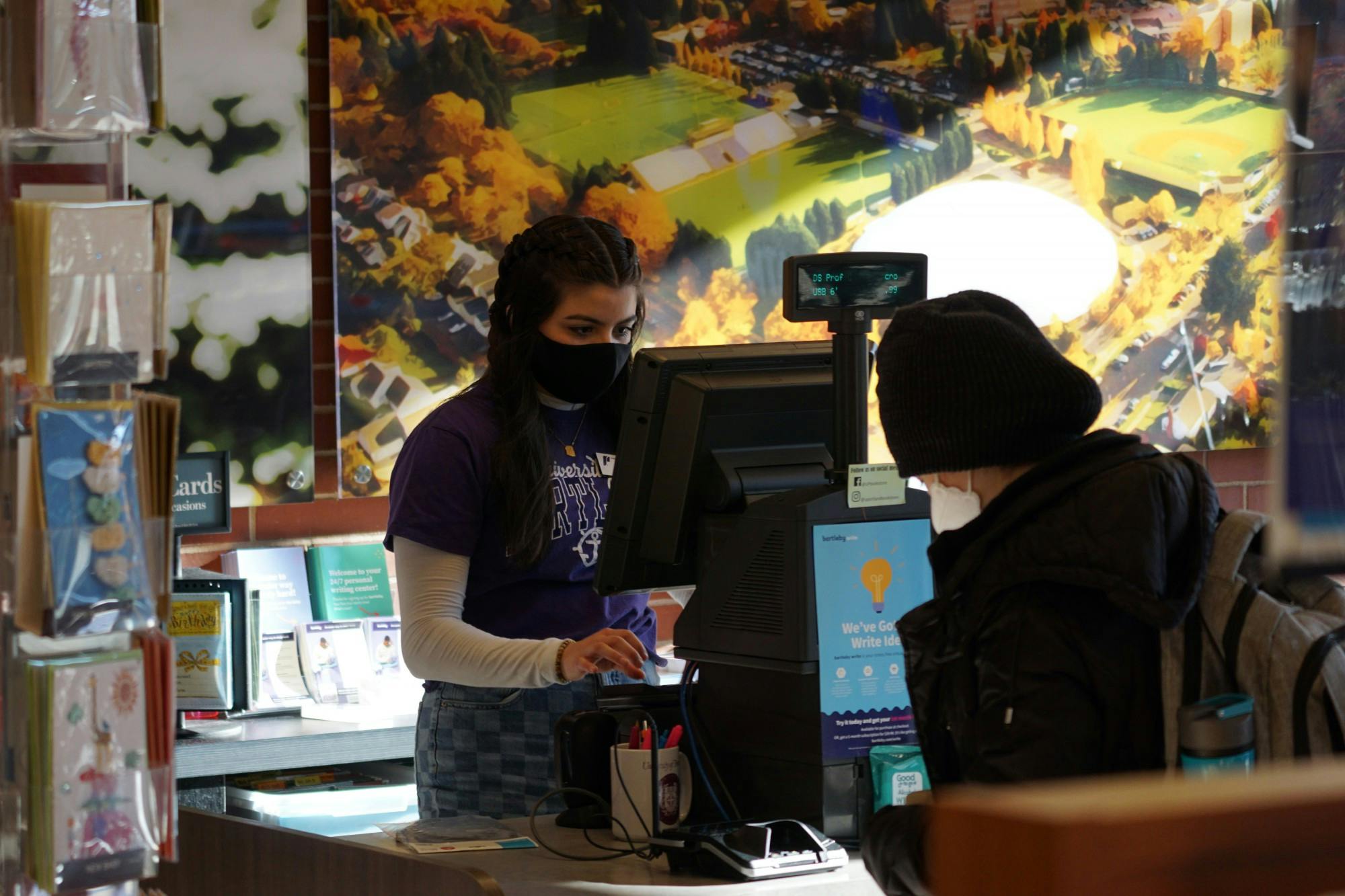 Freshman Abby Guzman working the Bookstore register.