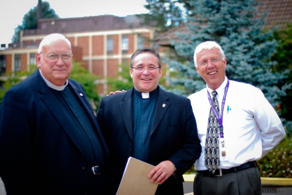  Fr. Gary with Br. Donald Stabrowski and Special Events Director Bill Reed.