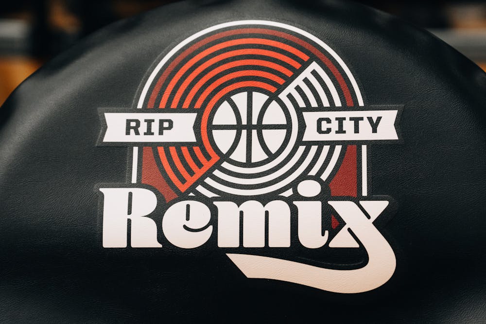 Rip City Remix branded chairs lining the basketball court in Chiles during the Fan Fest event.
