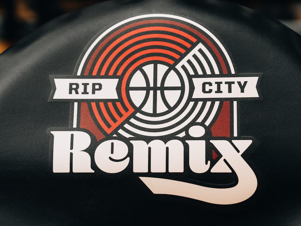 Rip City Remix branded chairs lining the basketball court in Chiles during the Fan Fest event.
