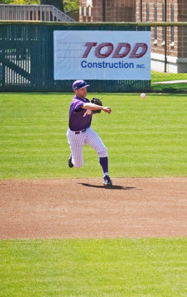  Caleb Whalen fields a ground ball in the team's game against USD. Photo by Spencer Young