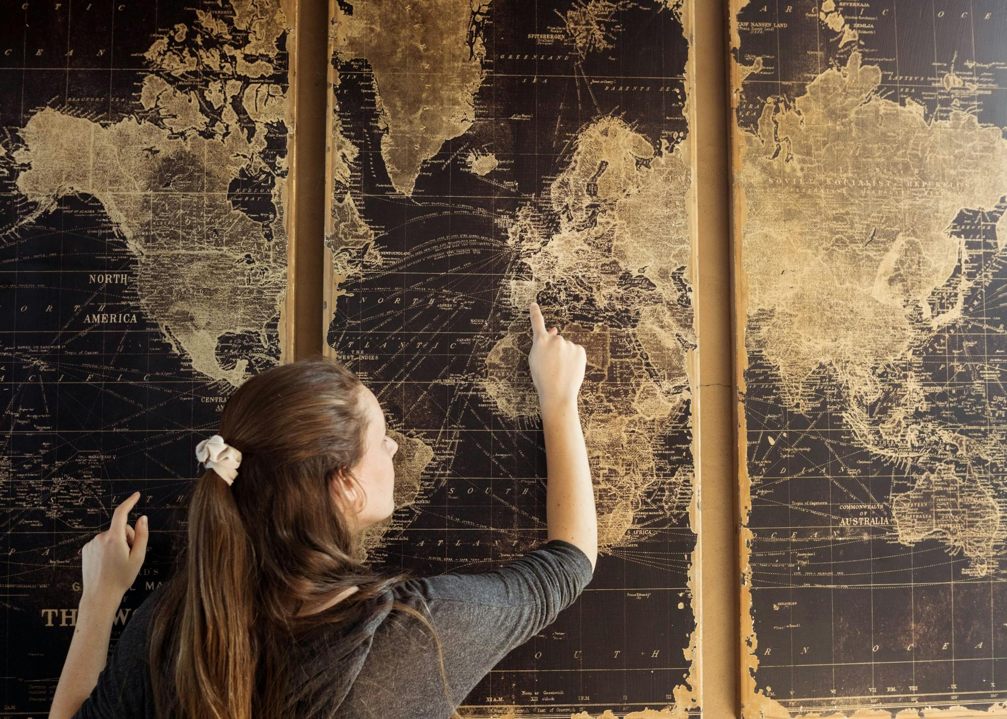 Students who were studying abroad had to return to the United States immediately, many having to cancel their plans to travel to other cities during their time abroad. Photo illustration by Annika Gordon. 