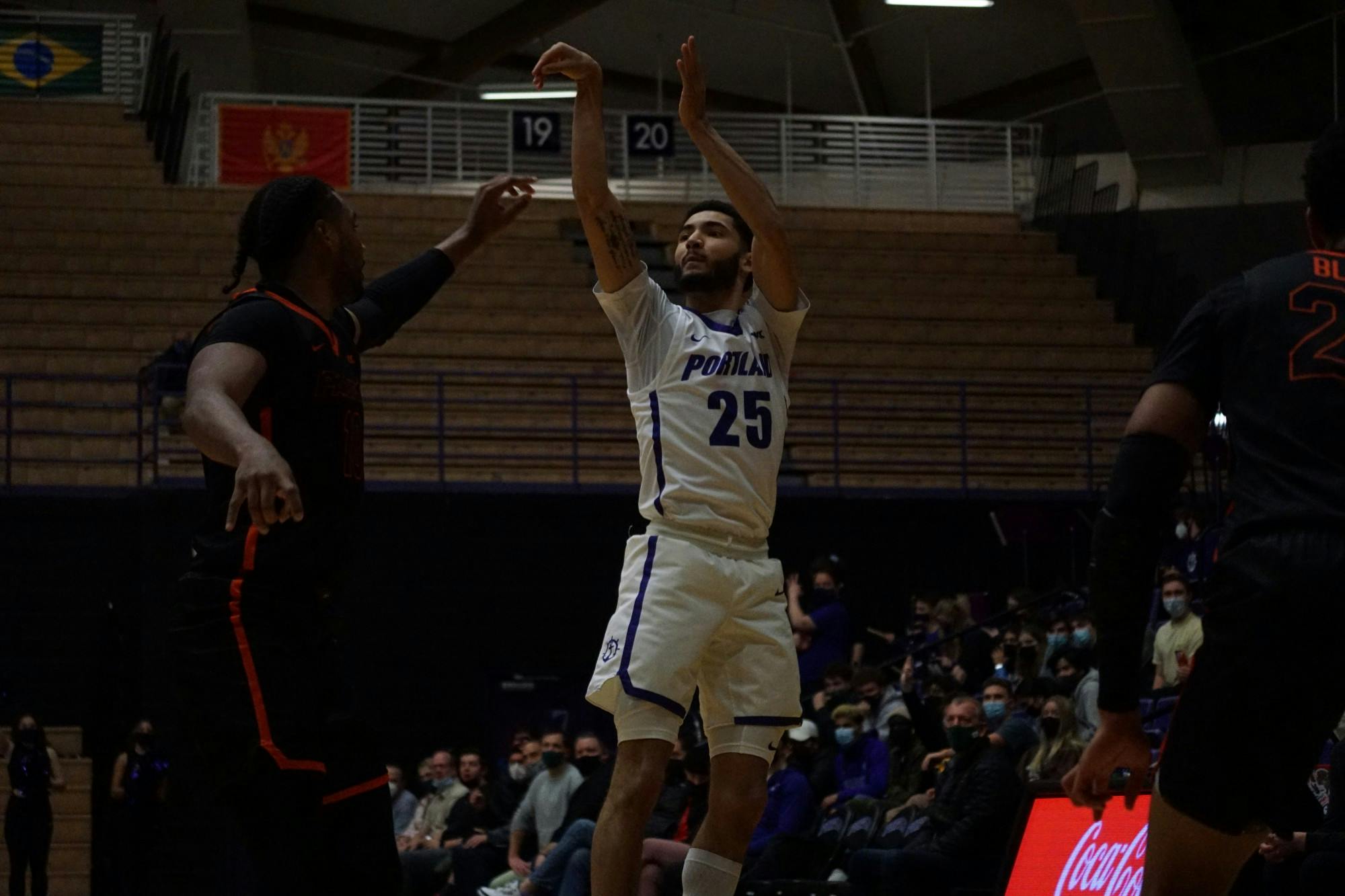Guard Mike Meadows shooting. Meadows finished with 7 points, 6 rebounds, and 3 assists against Pacific.