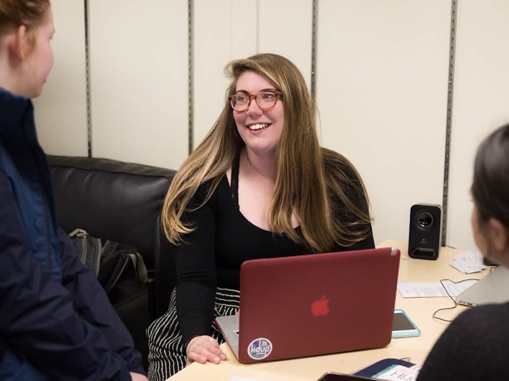 Rachel Rippetoe (above) helps reporters after a Beacon staff meeting. Rippetoe was recently named as the Beacon's next editor-in-chief.&nbsp;