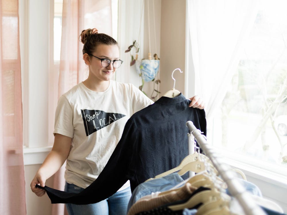 Senior Courtney Warta puts a spin on green fashion by selling second-hand clothing on Poshmark.