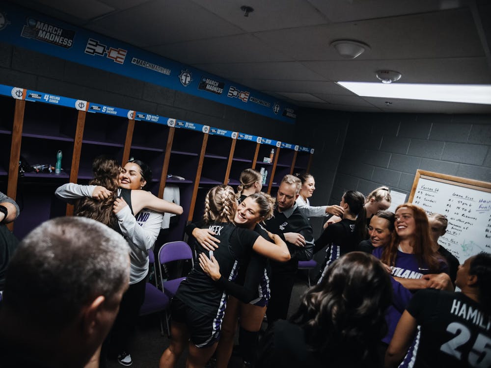 The UP women's basketball team regroups in the locker room following their loss to Kansas State University in the opening round of the 2024 NCAA tournament. Photo courtesy of Marcos Romero-Turner. 