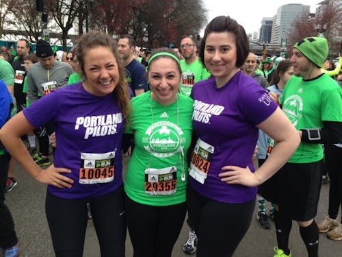  Jennifer Rillamas (center) stands with Kelly Riley (left) and Guinevere Getchell (right) at Portland's annual Shamrock run. Rillamas participated in the 5K race. Photo courtesy of Jennifer Rillamas