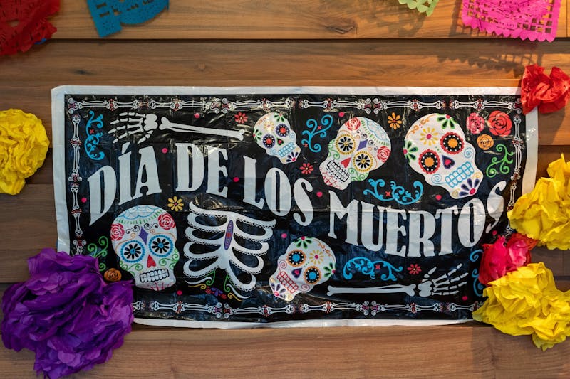 A Dia de los Muertos banner welcomes visitors into the commons.