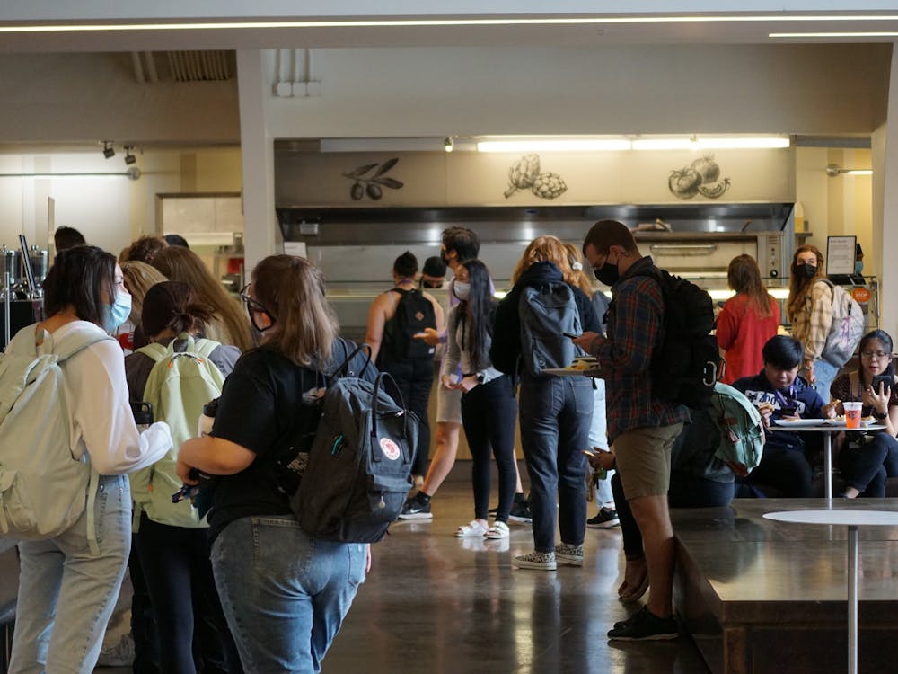 Students wait in line at The Commons.