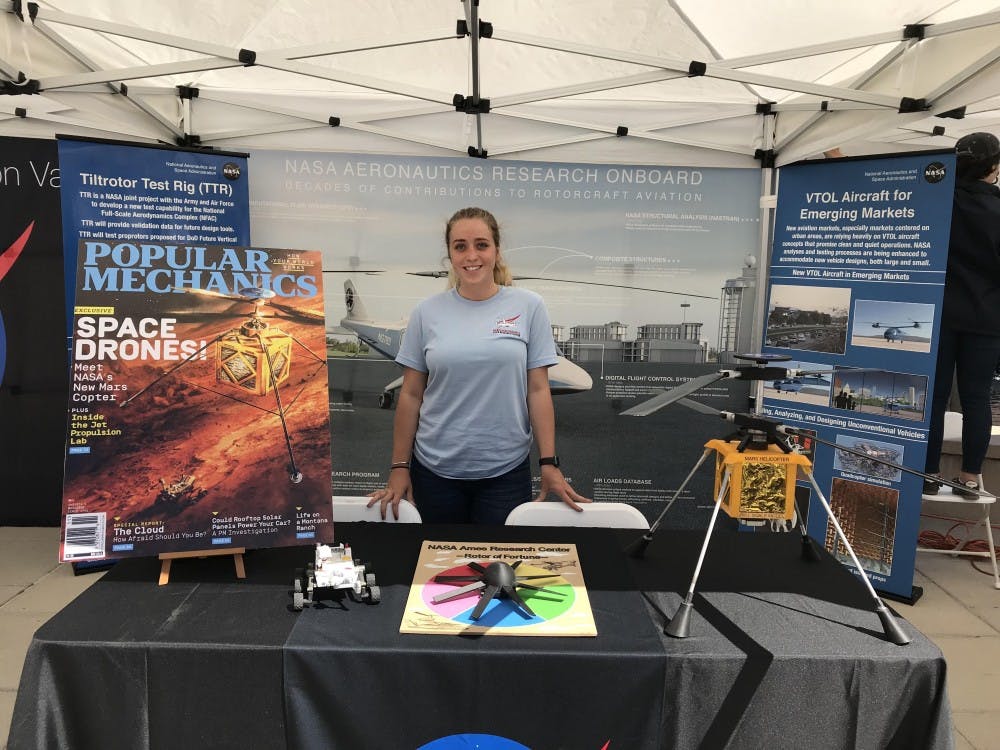 Lillia Smith works the NASA booth at a Tech Showcase in Mountain View. She was part of the outreach committee for the Aeromechanics branch. Photo courtesy of Lillia Smith.