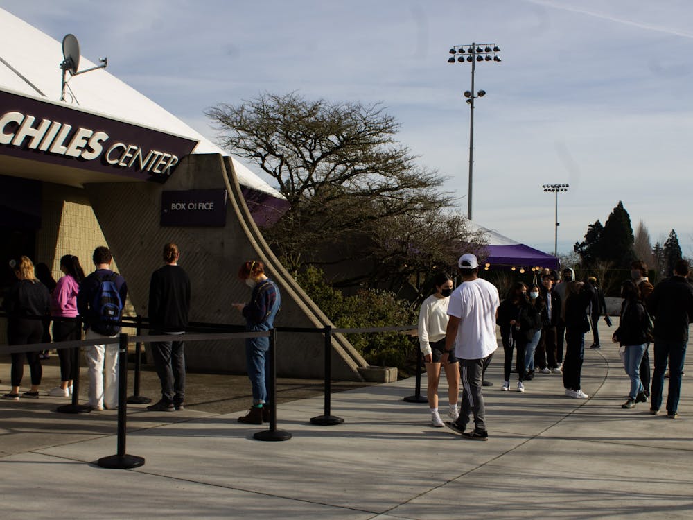 Students line up at the Chiles Center to pick up COVID tests. UP is requiring all students to take an at home test prior to returning to in-person learning.