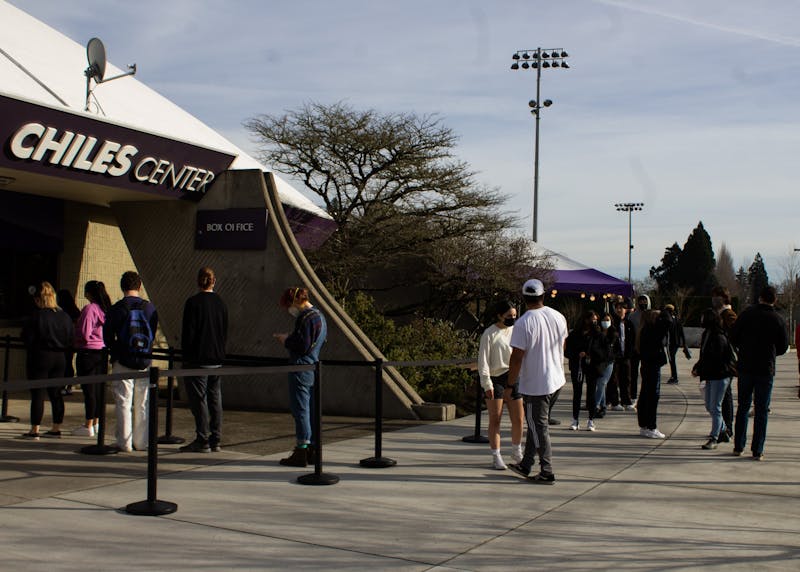Students line up at the Chiles Center to pick up COVID tests. UP is requiring all students to take an at home test prior to returning to in-person learning.